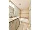 Bathroom featuring granite vanity, updated fixtures, and shower-tub combo at 3544 Citrus Dr, Duluth, GA 30096