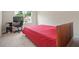 Bedroom featuring a bed, desk with chair, and window with natural light at 1630 Eaglerock Dr, Suwanee, GA 30024