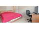 Comfortable bedroom with a view of the open doorway to the hallway and an office at 1630 Eaglerock Dr, Suwanee, GA 30024