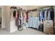 Spacious walk-in closet featuring wire shelving and extra storage at 1630 Eaglerock Dr, Suwanee, GA 30024