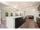 Bright and airy kitchen boasts a large island, recessed lighting, and stainless steel sink at 1630 Eaglerock Dr, Suwanee, GA 30024