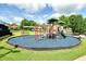 Outdoor playground features a playset with slides, climbing structures and mature landscaping at 1630 Eaglerock Dr, Suwanee, GA 30024