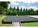 Community playground has swings and a basketball court in a well-maintained outdoor area at 1630 Eaglerock Dr, Suwanee, GA 30024