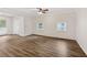 Bright bedroom with ample natural light, wood-look floors, and a ceiling fan at 2049 Phillips Dr, Atlanta, GA 30315
