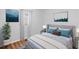 Cozy bedroom features neutral tones, hardwood flooring, and natural light at 2049 Phillips Dr, Atlanta, GA 30315