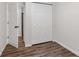 Bedroom with closet, hardwood flooring and neutral paint at 2049 Phillips Dr, Atlanta, GA 30315