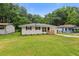 Charming single-story home with a well-maintained lawn and inviting curb appeal at 2049 Phillips Dr, Atlanta, GA 30315