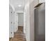 Hallway with hardwood flooring and neutral paint at 2049 Phillips Dr, Atlanta, GA 30315