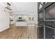 Modern open-concept kitchen with stainless steel appliances and an island at 2049 Phillips Dr, Atlanta, GA 30315