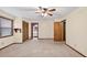 Bright bedroom with a ceiling fan and closet space at 3328 Hidden Bluff Trl, Snellville, GA 30039