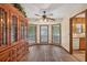 Dining room with hardwood floors and cabinet at 3328 Hidden Bluff Trl, Snellville, GA 30039