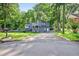 Charming two-story home with an attached garage and a well-maintained front yard at 3328 Hidden Bluff Trl, Snellville, GA 30039