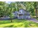 Charming two-story home with an attached garage and a well-maintained front yard at 3328 Hidden Bluff Trl, Snellville, GA 30039