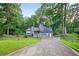 Charming two-story home with an attached garage and a well-maintained front yard at 3328 Hidden Bluff Trl, Snellville, GA 30039