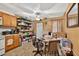 Compact kitchen with essential appliances, shelving, and dining area at 3328 Hidden Bluff Trl, Snellville, GA 30039