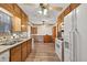 Bright kitchen with granite countertops and white appliances at 3328 Hidden Bluff Trl, Snellville, GA 30039