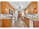 Bright kitchen with hardwood floors and granite countertops at 3328 Hidden Bluff Trl, Snellville, GA 30039