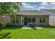 The backyard features a patio and a well-maintained lawn, perfect for outdoor activities and relaxation at 505 Appalachian Woods Dr, Canton, GA 30114