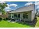 The backyard features a patio and a well-maintained lawn, perfect for outdoor activities and relaxation at 505 Appalachian Woods Dr, Canton, GA 30114