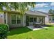 Charming backyard features a patio and lush green lawn, ideal for outdoor enjoyment at 505 Appalachian Woods Dr, Canton, GA 30114