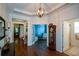 Elegant foyer with hardwood floors, tray ceilings, and decorative lighting at 505 Appalachian Woods Dr, Canton, GA 30114