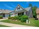 Quaint one-story home with manicured landscaping, a covered front porch, and a well-kept lawn at 505 Appalachian Woods Dr, Canton, GA 30114