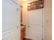 Hallway area with storage and easy access to the garage or other areas at 505 Appalachian Woods Dr, Canton, GA 30114