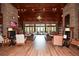 Relaxing community room with a fireplace, comfortable chairs and sofas, and bookshelves filled with books at 505 Appalachian Woods Dr, Canton, GA 30114