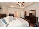 Spacious main bedroom with ample storage and a view of a nicely staged bed at 505 Appalachian Woods Dr, Canton, GA 30114