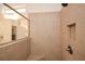 Close up of the tiled shower with a glass enclosure and built in niche at 505 Appalachian Woods Dr, Canton, GA 30114