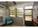 Comfortable sunroom with a view of the backyard, offering a serene space for unwinding and enjoying nature at 505 Appalachian Woods Dr, Canton, GA 30114