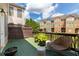 Relax on this back deck with a view of the townhome community and lush greenery at 6426 Queens Court Trce # 7, Mableton, GA 30126