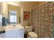 Bathroom featuring a patterned shower curtain and sink at 6426 Queens Court Trce # 7, Mableton, GA 30126