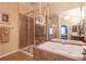 Relaxing bathroom with a luxurious soaking tub and a separate glass shower at 6426 Queens Court Trce # 7, Mableton, GA 30126