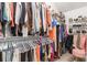 Well organized closet with hanging clothes and shoes on shelves at 6426 Queens Court Trce # 7, Mableton, GA 30126