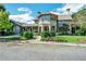 Beautiful clubhouse with stone and siding exterior and manicured landscaping at 6426 Queens Court Trce # 7, Mableton, GA 30126