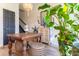 Bright dining area showcases decorative table and hutch near a staircase, perfect for entertaining at 6426 Queens Court Trce # 7, Mableton, GA 30126