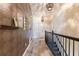 Hallway with elegant decorations and wooden floors leads to other parts of the house at 6426 Queens Court Trce # 7, Mableton, GA 30126