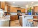 Spacious kitchen featuring light wood cabinets, granite countertops and eat-in bar at 6426 Queens Court Trce # 7, Mableton, GA 30126
