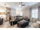 Spacious living room with a comfortable sectional sofa and modern decor at 6426 Queens Court Trce # 7, Mableton, GA 30126