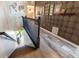 Well-lit staircase leads to the lower level with patterned wall paper and tile flooring at 6426 Queens Court Trce # 7, Mableton, GA 30126