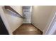 Staircase with wood steps and railing with ''hello adventure'' painted on wall at 6426 Queens Court Trce # 7, Mableton, GA 30126