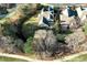 Aerial shot of the property surrounded by mature trees and well-maintained landscaping at 1000 Collingtree Ct, Mcdonough, GA 30253