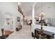 Grand foyer with soaring ceilings, elegant staircase, chandelier, and stylish decor setting a luxurious tone at 1000 Collingtree Ct, Mcdonough, GA 30253