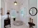 Elegant foyer with high ceilings, decorative lighting, marble floors, and a welcoming entrance at 1000 Collingtree Ct, Mcdonough, GA 30253