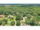 An aerial view of the community with mature trees at 2020 Ridge Gate Drive Dr, Cumming, GA 30041