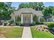 Exterior view of the community clubhouse surrounded by meticulous landscaping at 2020 Ridge Gate Drive Dr, Cumming, GA 30041