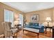 Cozy living room with hardwood floors, comfortable seating, and natural light at 2020 Ridge Gate Drive Dr, Cumming, GA 30041