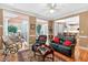 Cozy living room featuring hardwood floors, stylish furniture, and an abundance of natural light at 2020 Ridge Gate Drive Dr, Cumming, GA 30041