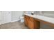 Bright bathroom featuring tile floors, wooden cabinets and a granite countertop at 2873 Snapfinger Mnr, Decatur, GA 30035